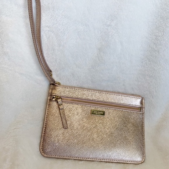 kate spade Handbags - KATE SPADE Rose Gold Tinie Laurel Wristlet
